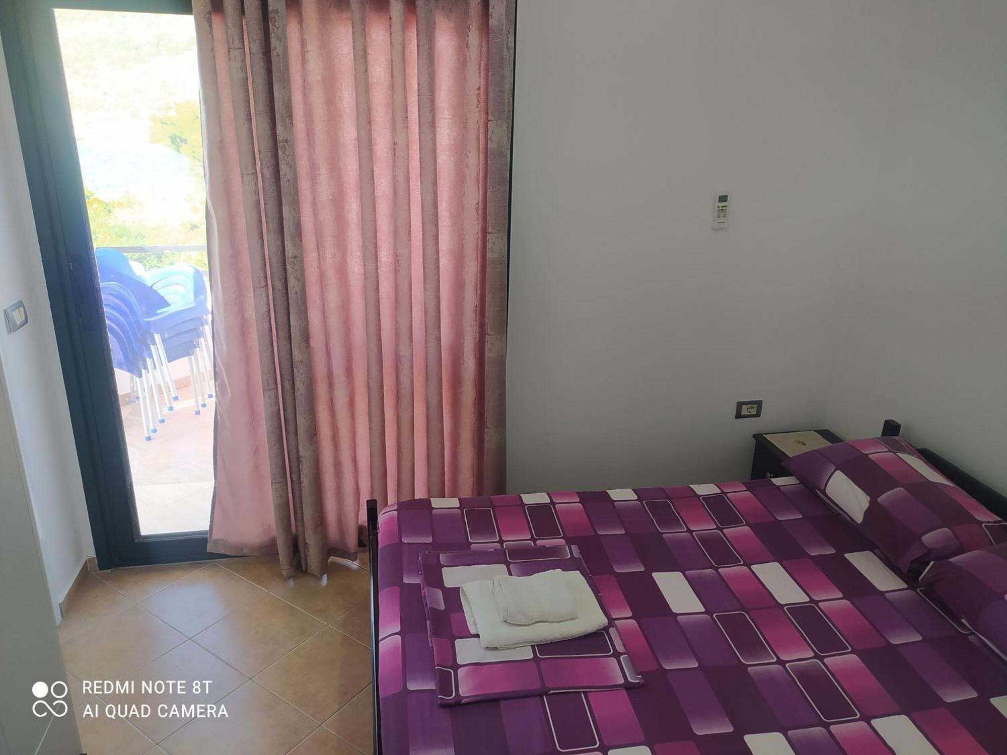 Apartment Erjon Ксамил Стая снимка