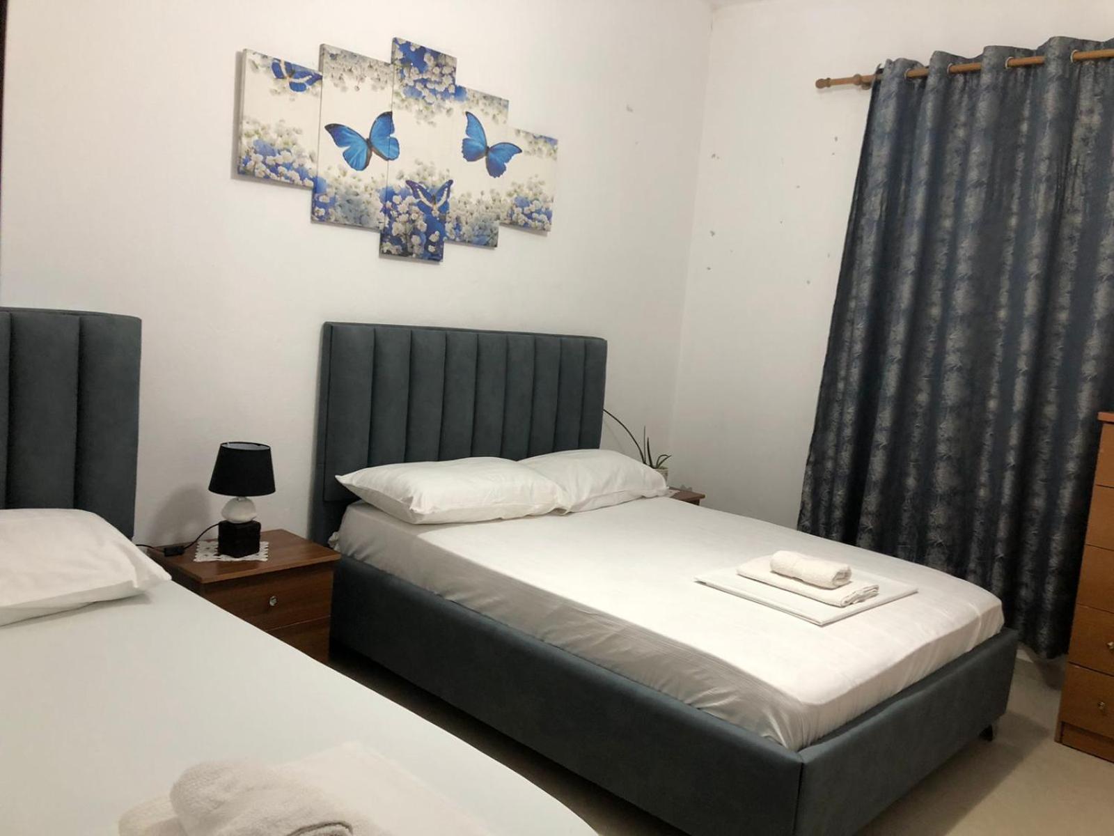 Apartment Erjon Ксамил Стая снимка